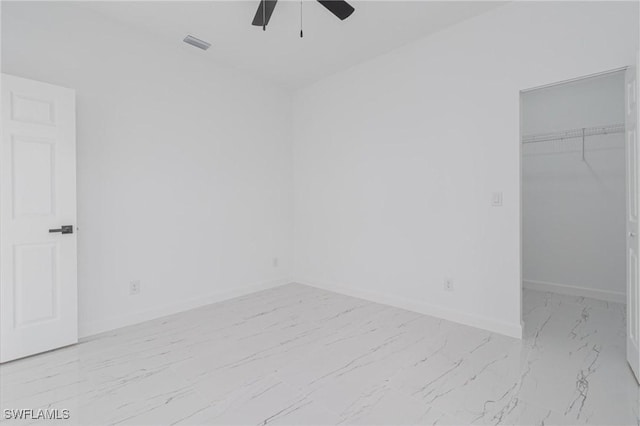 empty room featuring ceiling fan