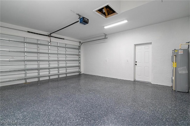 garage with a garage door opener and water heater