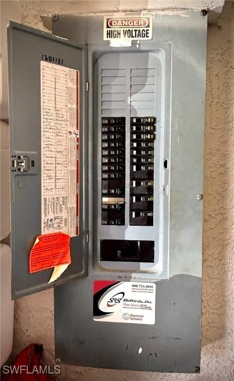 utility room featuring electric panel