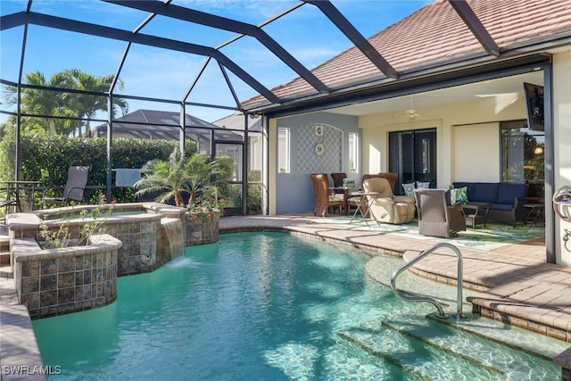 view of swimming pool with a patio area, an outdoor living space, an in ground hot tub, and a lanai