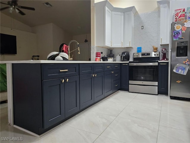 kitchen featuring white cabinetry, sink, decorative backsplash, ceiling fan, and stainless steel appliances