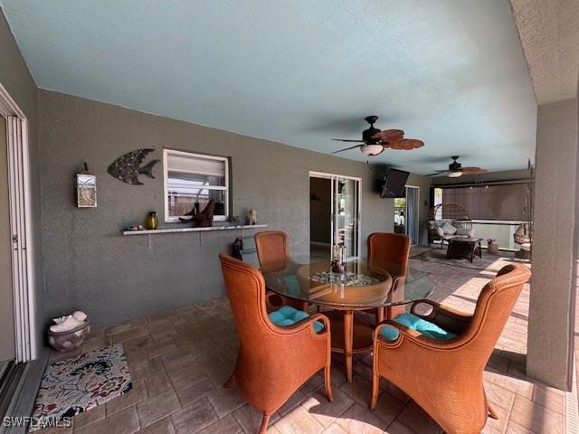 view of patio with ceiling fan