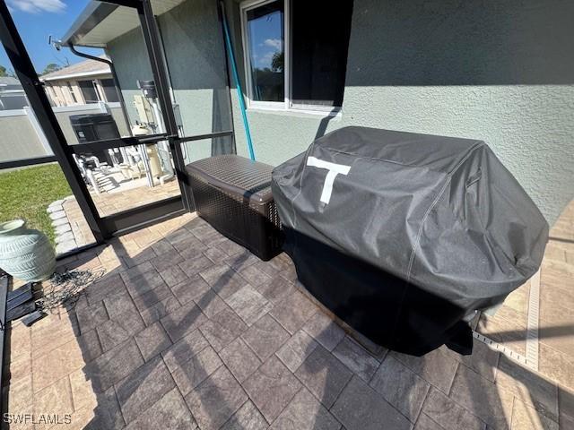 view of patio with grilling area