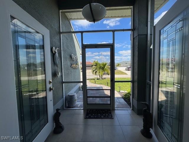 entryway featuring tile patterned flooring