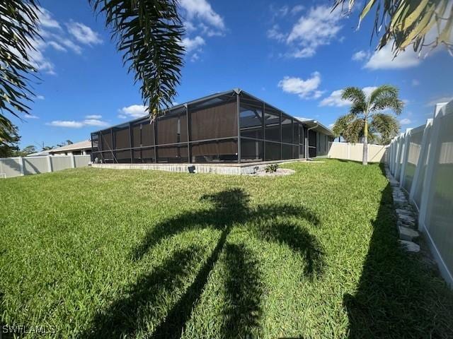 view of yard with a lanai