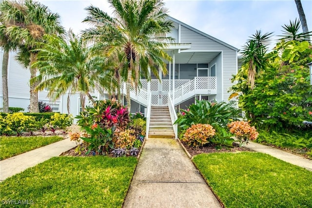 beach home with a sunroom