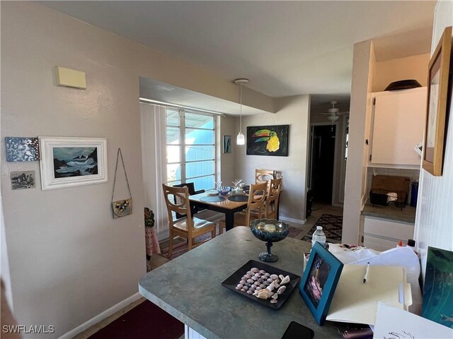 dining room with ceiling fan