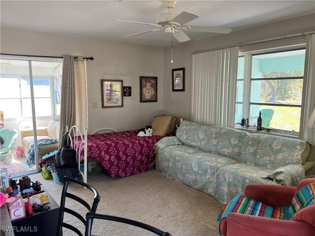 bedroom featuring ceiling fan and carpet flooring