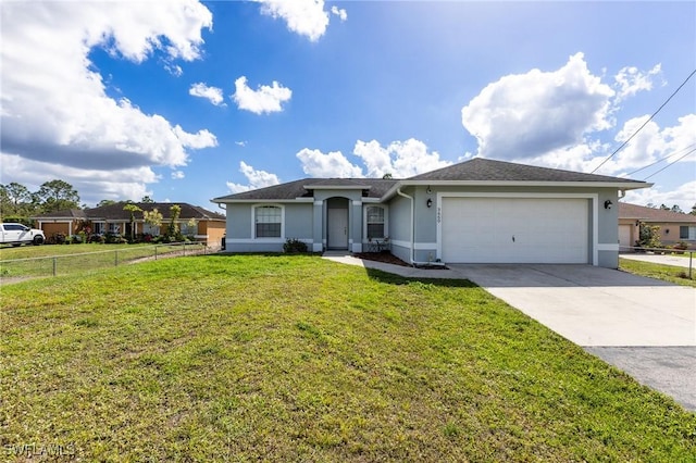 ranch-style home with a garage and a front yard