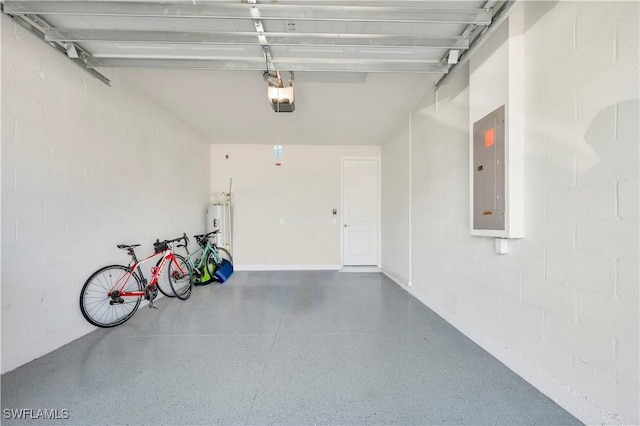 garage with a garage door opener, electric panel, and water heater