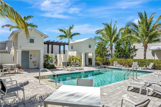 view of pool with a patio area and a pergola