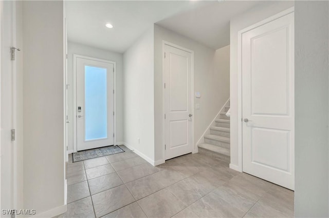 view of tiled foyer entrance