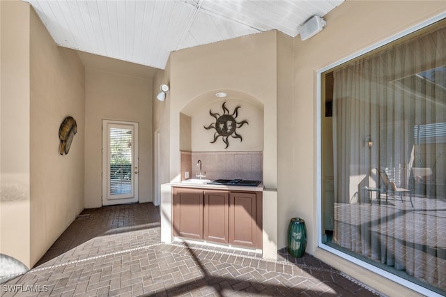 view of patio / terrace with sink and exterior kitchen