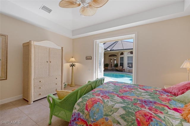 bedroom with light tile patterned floors