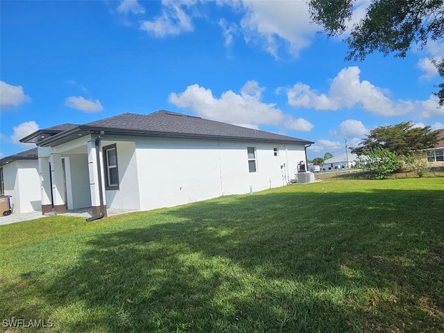 view of property exterior with a lawn