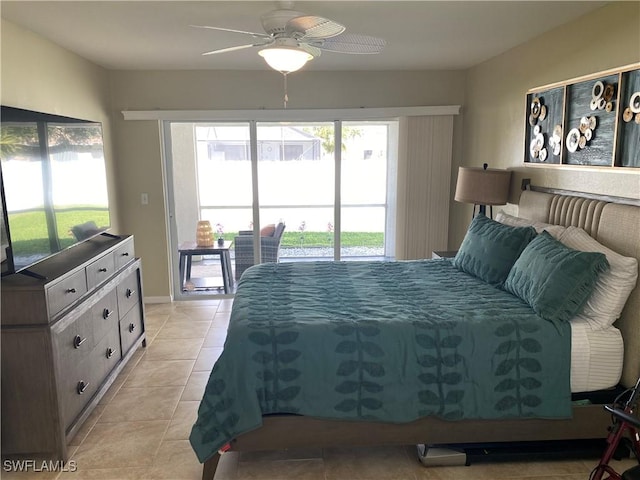 tiled bedroom featuring access to exterior and ceiling fan