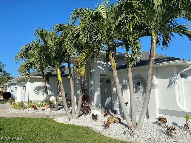 view of home's exterior featuring a lawn