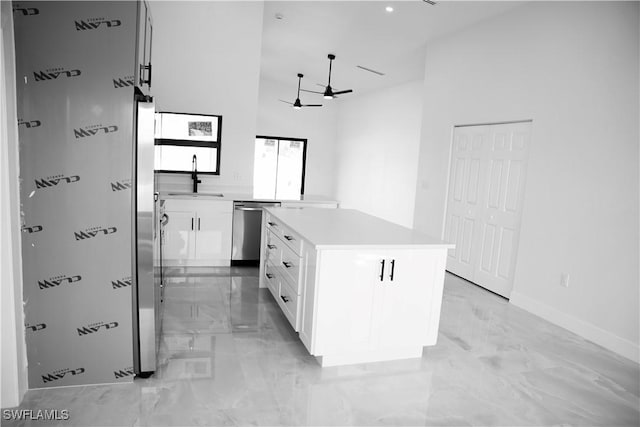 919 Columbus Blvd S, Lehigh Acres, FL 33974 - kitchen featuring dishwasher, light marble finish flooring, a sink, a center island, and a high ceiling