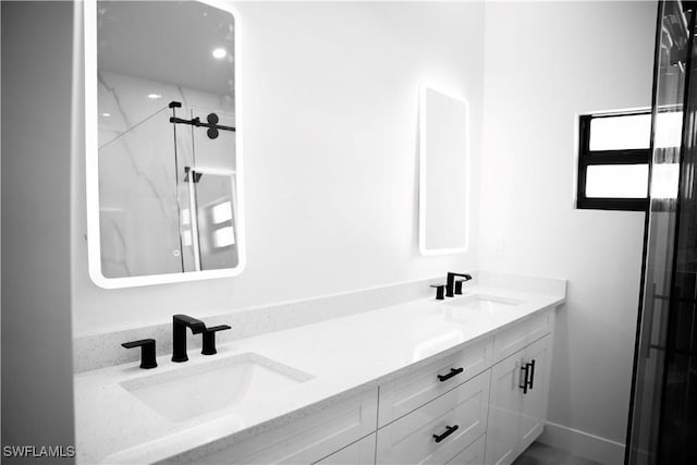 919 Columbus Blvd S, Lehigh Acres, FL 33974 - bathroom with double vanity and a marble finish shower