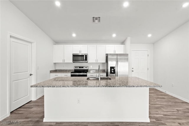 kitchen featuring white cabinetry, a kitchen island with sink, and stainless steel appliances