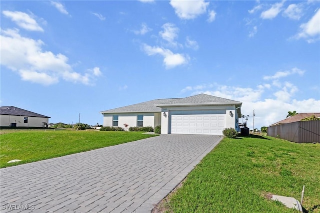 ranch-style house featuring a front lawn and a garage