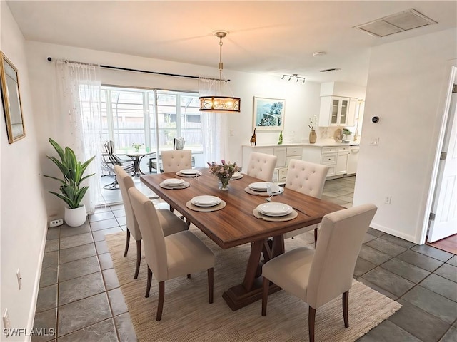 view of tiled dining area