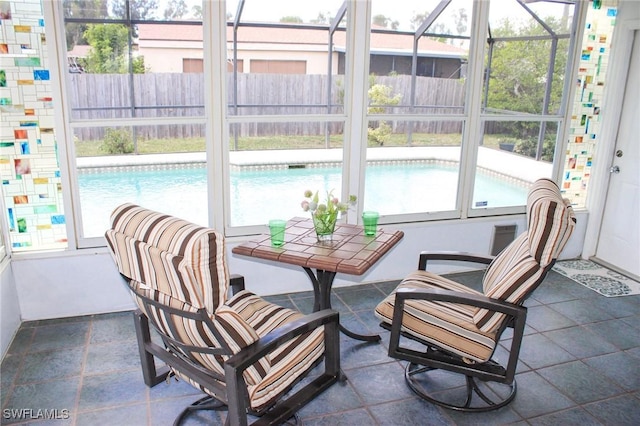 sunroom / solarium with plenty of natural light