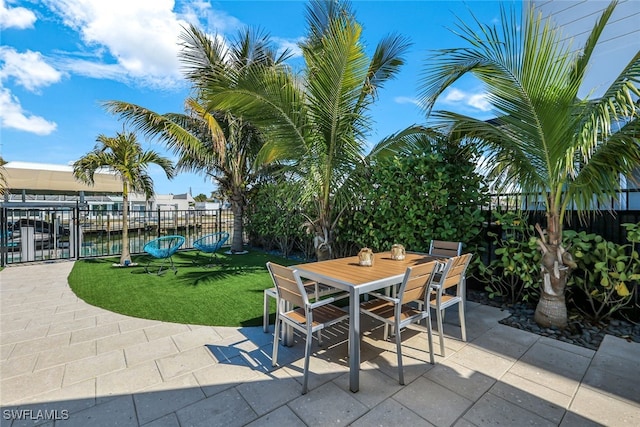 view of patio / terrace with a water view