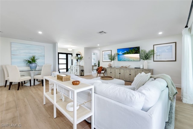 living room featuring light hardwood / wood-style flooring