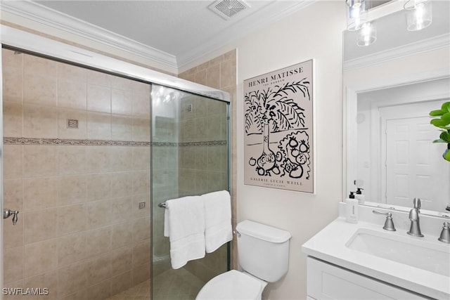 bathroom featuring vanity, crown molding, toilet, and walk in shower