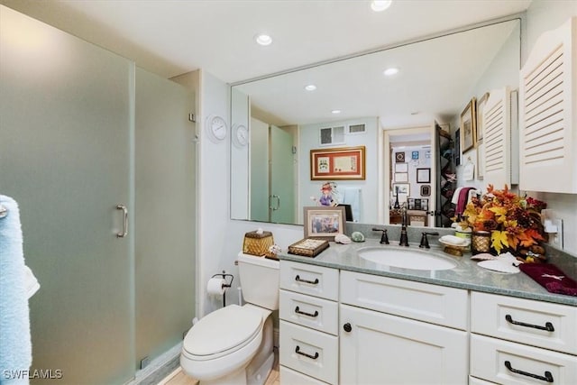 full bathroom with visible vents, toilet, recessed lighting, a shower stall, and vanity