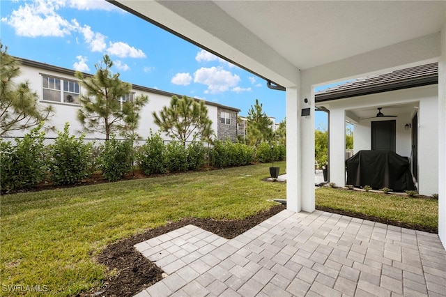 view of yard featuring a patio area and fence