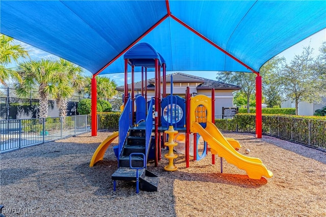 community jungle gym with fence