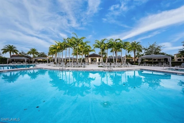 community pool with a patio