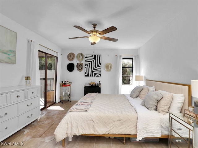 9831 Alabama St Unit 5, Bonita Springs, FL 34135 - bedroom with access to outside and ceiling fan