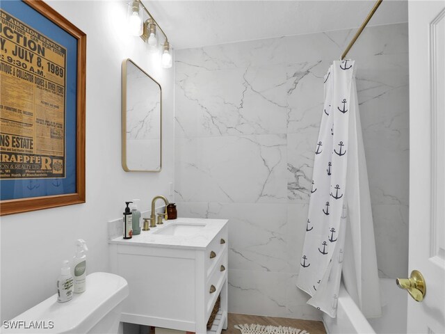 9831 Alabama St Unit 5, Bonita Springs, FL 34135 - full bathroom featuring vanity, toilet, and shower / bath combo