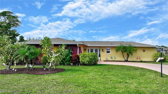 ranch-style house with a front yard