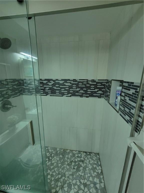 bathroom with an enclosed shower