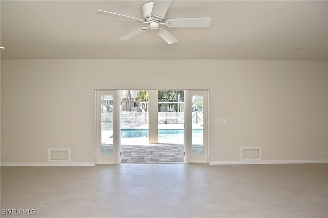 spare room featuring ceiling fan