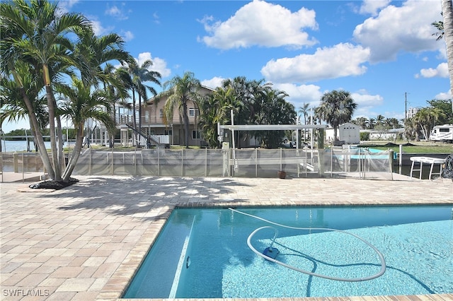 view of swimming pool featuring a patio