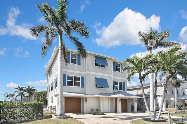 view of front of home with a garage