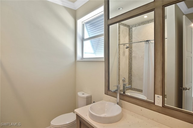 bathroom featuring vanity, ornamental molding, toilet, and a shower with shower curtain