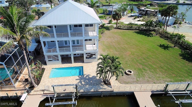 birds eye view of property with a water view