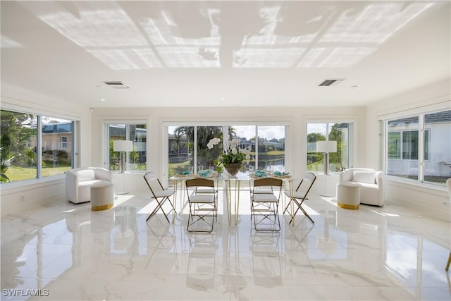 sunroom with a healthy amount of sunlight