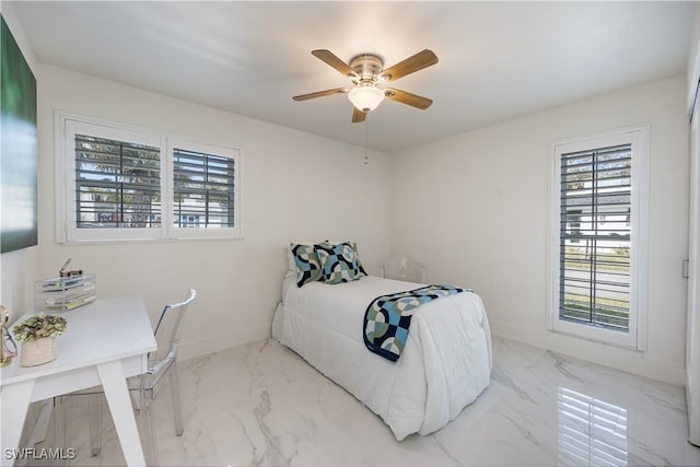 bedroom featuring ceiling fan