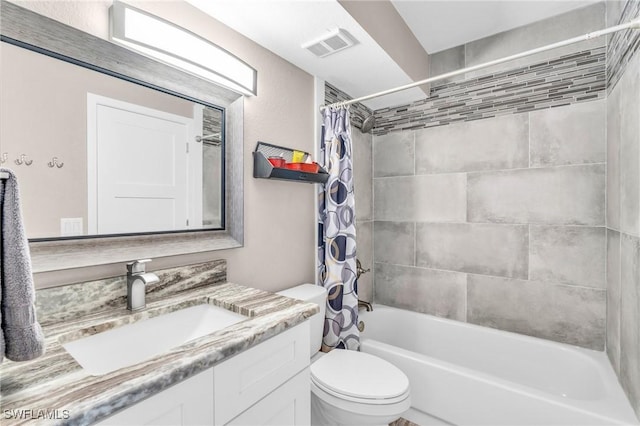 full bathroom featuring vanity, shower / bathtub combination with curtain, and toilet