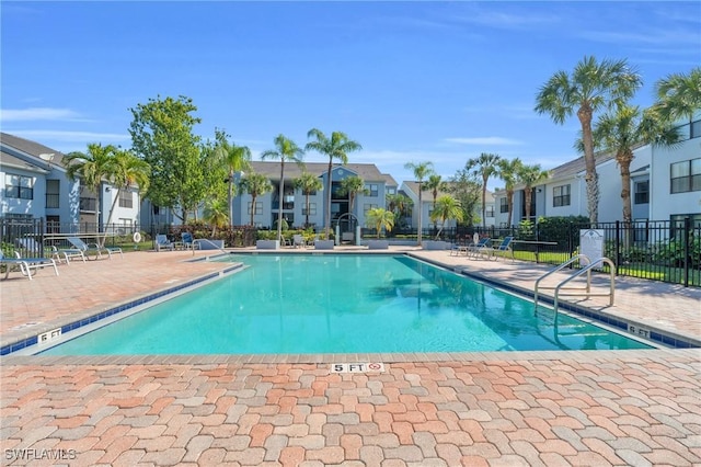 view of swimming pool featuring a patio