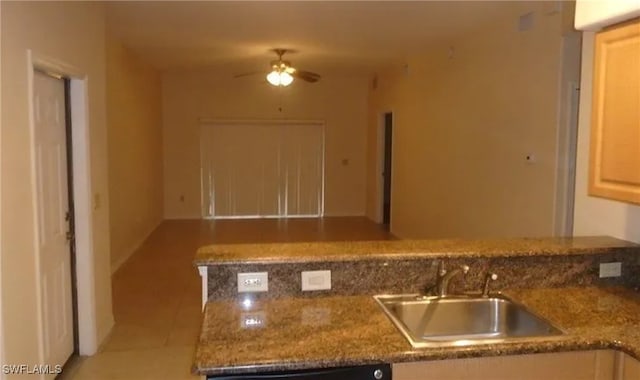 kitchen with ceiling fan, dishwasher, and sink