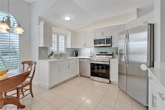 kitchen featuring white cabinetry, stainless steel appliances, and sink