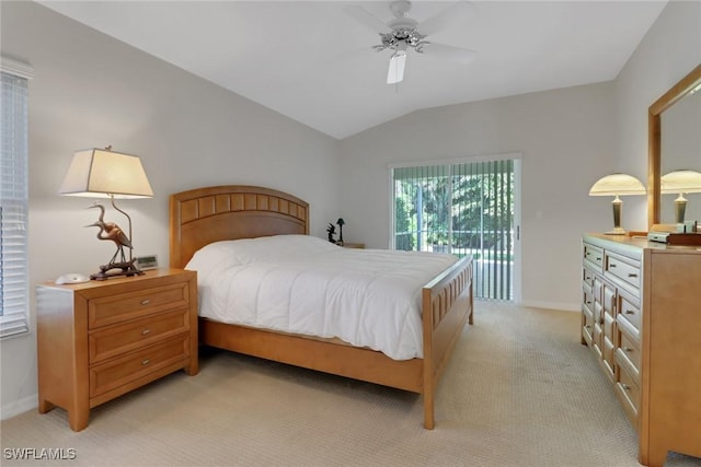 bedroom with light carpet, access to exterior, vaulted ceiling, and ceiling fan